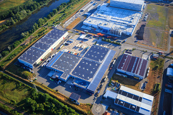 Oblique view of Oberwald industrial area with SKA Sitze GmbH, WAS Logistics, Com Transporte GmbH and NUSS Group in Wörth am Rhein in the state Rhineland-Palatinate, Germany