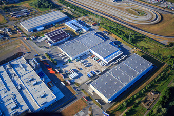 Oberwald industrial area with SKA Sitze GmbH, WAS Logistics, Com Transporte GmbH and NUSS Group in Wörth am Rhein in the state Rhineland-Palatinate, Germany from the plane