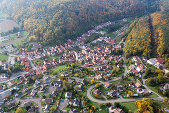 Village - view on the edge of agricultural fields and farmland in Rothbach in Grand Est, France