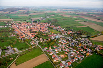 Village - view on the edge of agricultural fields and farmland in Uhrwiller in Grand Est, France