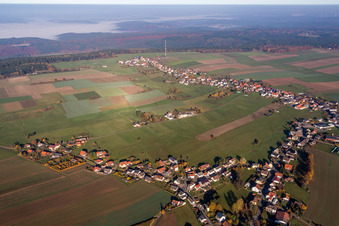 Village - view on the edge of agricultural fields and farmland in Wuerzberg in the state Hesse, Germany