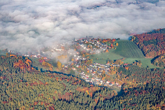 Aerial view of View of the town under morning mist in the district Erlenbach in Erbach in the state Hesse, Germany