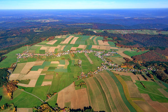 Aerial view of Village - view on the edge of agricultural fields and farmland in Wuerzberg in the state Hesse, Germany