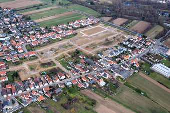 Construction sites for new construction residential area of detached housing estate Salierstrasse in the district Heiligenstein in Roemerberg in the state Rhineland-Palatinate, Germany