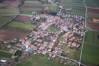 Aerial view of Village - view on the edge of agricultural fields and farmland in Grossfischlingen in the state Rhineland-Palatinate, Germany