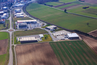 Industrial area in the Speyer Valley with ITK Engineering GmbH, Resinnovation GmbH, TRANSAC International Shipping Company Ltd., and Markthalle 5 in Rülzheim in the state Rhineland-Palatinate, Germany
