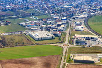 Industrial area in the Speyer Valley with ITK Engineering GmbH, TRANSAC International Shipping Company Ltd., and DBK David + Baader GmbH in Rülzheim in the state Rhineland-Palatinate, Germany