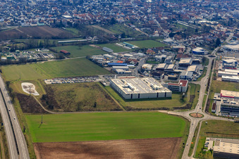 Aerial view of Industrial area in the Speyer Valley with ITK Engineering GmbH, TRANSAC International Shipping Company Ltd., and DBK David + Baader GmbH in Rülzheim in the state Rhineland-Palatinate, Germany