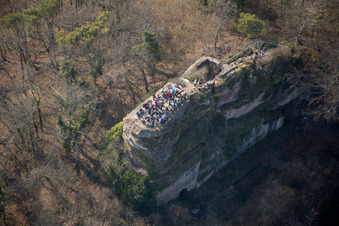 Hikers on the Ruins and vestiges of the former castle and fortress Neukastel in Leinsweiler in the state Rhineland-Palatinate