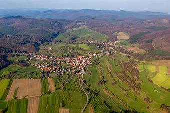 Aerial view of Village - view on the edge of agricultural fields and farmland in Wingen in Grand Est, France