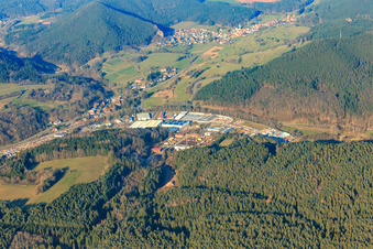 Reichenbach industrial area from the southwest with construction site of Frank Handels-GmbH & Co. KG - Administration in Dahn in the state Rhineland-Palatinate, Germany