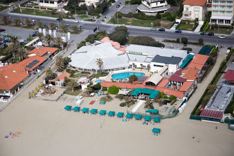Coastline on the sandy beach of the Ligurian sea in Forte dei Marmi in Toskana, Italy