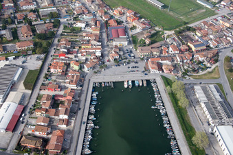 Pleasure boat marina with docks and moorings on the shore area der Adria in Goro in Emilia-Romagna, Italy out of the air