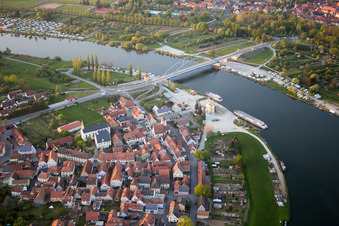 Pier with excursion boats on the Main in front of the Main Bridge Volkach in the district Astheim in Volkach in the state Bavaria, Germany