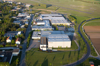 Aerial view of Industrial estate and company settlement Flugplatzstrasse in the district Etwashausen in Kitzingen in the state Bavaria, Germany