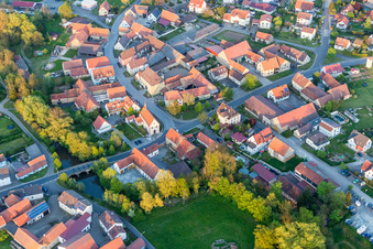 Aerial view of Church building in the village of in the district Laub in Prichsenstadt in the state Bavaria, Germany