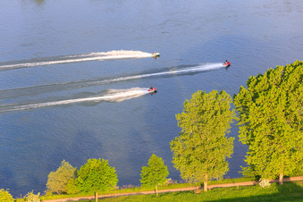 Three water scooters on the Rhine in the district Mörsch in Frankenthal in the state Rhineland-Palatinate, Germany