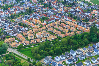 Aerial view of Malvenweg residential area with ochre-colored tiled roofs in Lorsch in the state Hesse, Germany