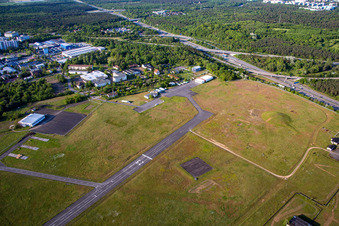 Runway with tarmac terrain of airfield August-Euler-Flugplatz in Griesheim in the state Hesse, Germany