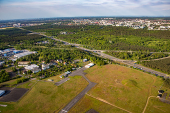 Aerial view of Runway with tarmac terrain of airfield August-Euler-Flugplatz in Griesheim in the state Hesse, Germany