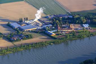 Intersnack Deutschland SE plant in Petersau on the banks of the Rhine and Carlo von Opel riding school at the Demeter Hofgut Petersau in the district Mörsch in Frankenthal in the state Rhineland-Palatinate, Germany