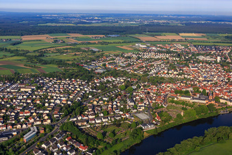 City overview on the banks of the Main from the east with monastery garden Seligenstadt in Seligenstadt in the state Hesse, Germany