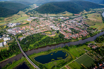 Aerial view of Village on the river bank areas of the Main river in Kleinheubach in the state Bavaria, Germany
