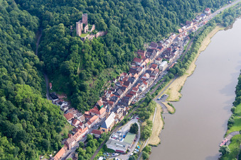 Fortress Henneburg over the Village on the river bank areas of the Main river in Stadtprozelten in the state Bavaria, Germany