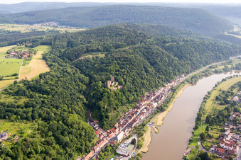 Aerial view of Fortress Henneburg over the Village on the river bank areas of the Main river in Stadtprozelten in the state Bavaria, Germany