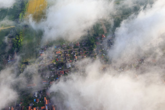 Wolfgangsgang Church under clouds in Freckenfeld in the state Rhineland-Palatinate, Germany
