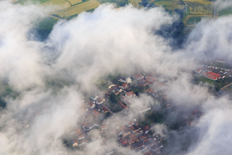 Primary school and Mundohalle under clouds in Minfeld in the state Rhineland-Palatinate, Germany