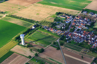 Water tower and church Unterdorf Lustadt in the district Niederlustadt in Lustadt in the state Rhineland-Palatinate, Germany