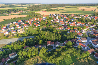 Village - view on the edge of agricultural fields and farmland in Zeholfing in the state Bavaria, Germany