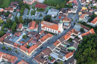 Aerial view of Church building in of Stadtpfarrkirche St . Maria Old Town- center of downtown in Landau an der Isar in the state Bavaria, Germany