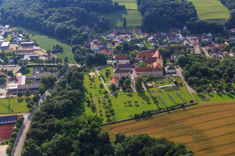 Parish Church of St. Mary's Assumption and St. Mary's Secondary School with monastery garden and solar park in Niederviehbach in the state Bavaria, Germany