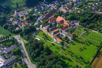 Aerial photograpy of Parish Church of St. Mary's Assumption and St. Mary's Secondary School with monastery garden and solar park in Niederviehbach in the state Bavaria, Germany