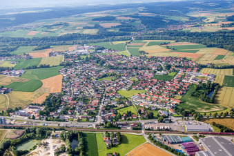 Village - view on the edge of agricultural fields and farmland in the district Kronwieden in Loiching in the state Bavaria, Germany