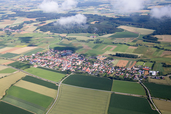 Town View of the streets and houses below clouds of the residential areas in Geiselhoering in the state Bavaria