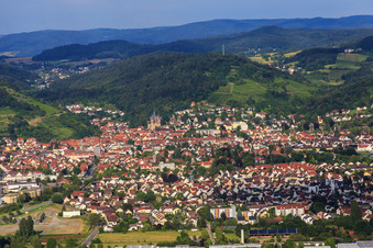 City view with St. Peter's Church on the edge of the Odenwald from the west below the vineyards in Heppenheim in the state Hesse, Germany