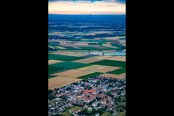 Village - view on the edge of agricultural fields and farmland in the district Ibersheim in Worms in the state Rhineland-Palatinate, Germany