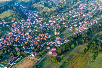 Village - view on the edge of agricultural fields and farmland in Sippersfeld in the state Rhineland-Palatinate, Germany