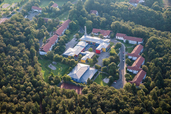 The Schillerhain Special Education Center, a boarding school and school run by the Evangelische Heimstiftung Pfalz (Youth Welfare Foundation), is a facility of the Evangelische Heimstiftung Pfalz (Evangelical Home Foundation of the Palatinate). Above center, the "Haus Michel" (House Michel), owned by the Heimstiftung (Youth Welfare Foundation). Above right, the former BASF recreation center. in Kirchheimbolanden in the state Rhineland-Palatinate, Germany