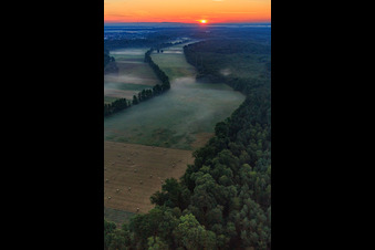 Sunrise in the Otterbachtal with morning mist in Kandel in the state Rhineland-Palatinate, Germany out of the air