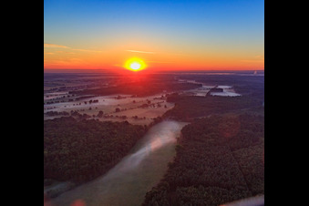 Sunrise in the Otterbachtal with morning mist in Kandel in the state Rhineland-Palatinate, Germany viewn from the air