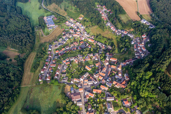 Aerial view of Village - view on the edge of agricultural fields and farmland in Lambsborn in the state Rhineland-Palatinate, Germany