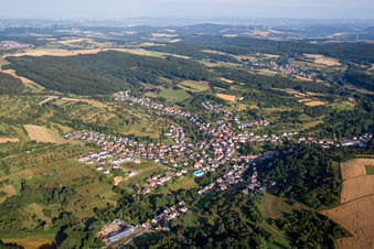 Village - view on the edge of agricultural fields and farmland in Dittweiler in the state Rhineland-Palatinate