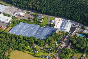 Industrial area Am Sauerbrunnen with Schwollener Sprudel GmbH & Co. KG, Markengetränke Schwollen GmbH and Hochwald Sprudel Schupp GmbH in Schwollen in the state Rhineland-Palatinate, Germany