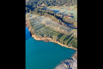 Shore of the quarry lake in the district Schlegldorf in Lenggries in the state Bavaria, Germany