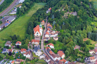 Aerial view of Protestant Church Winnweiler and Sacred Heart Church in Winnweiler in the state Rhineland-Palatinate, Germany