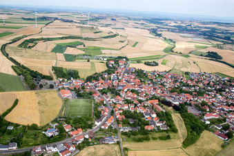 Village - view on the edge of agricultural fields and farmland in Kerzenheim in the state Rhineland-Palatinate, Germany